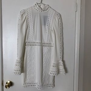 New with tags Fashion Nova White cut out mini dress size small